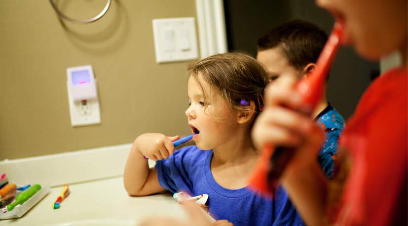 qual a quantidade de creme dental ideal para crianças